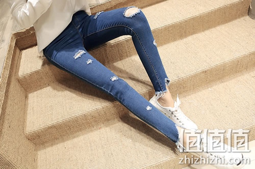格年女士破洞牛仔裤九分裤
