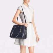 降10刀，COACH 蔻驰 Stamped 女士蛇纹真皮斜挎包 新低$209.99