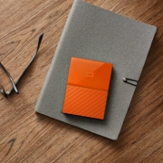 西部数据（WD）    My Passport 1TB 移动硬盘（2.5英寸、USB 3.0）橙色