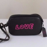 COACH蔻驰 KEITH HARING 爱情信使斜挎包 $64.99