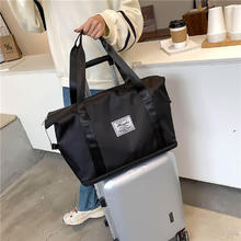 Etravel 易旅 行包 行李包 大容量外出差男女手提包健身包袋 可扩展款 黑色31.41元