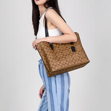 COACH 蔻驰 女包经典老花通勤托特包大容量单肩手提包正品