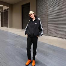 88VIP会员：adidas 阿迪达斯 女装运动套装 休闲梭织防风夹克上衣外套收口长裤两件套122.55元